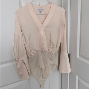 Cream colored bodysuit bell sleeve